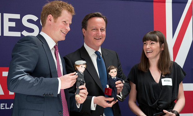 MakieLab's Jo Roach presents Harry and David Cameron with their Makie dolls