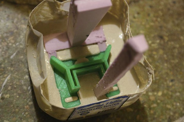 Printed part in a mix of 50% playground sand, 50% plaster of Paris and water. Printed part in a mix of 50% playground sand, 50% plaster of Paris and water.