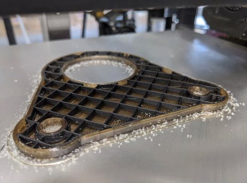 A dual-material print using PEEK and CF-PEEK with external faces milled using the ASMBL tool.png