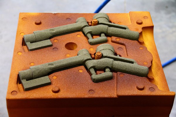 Complex core shapes that create the interior geometry of a vapor recovery fuel nozzleprinted as one monolithic part by Alpha Foundry Company in Missouri