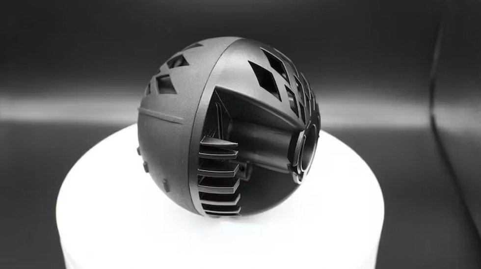 HP MJF 3D printed parts assembled into a sphere. Both are dyed black with one hemisphere vapour smoothed (right) and the other with a standard finish (left) HP MJF 3D printed parts assembled into a sphere. Both are dyed black with one hemisphere vapour smoothed (right) and the other with a standard finish (left)