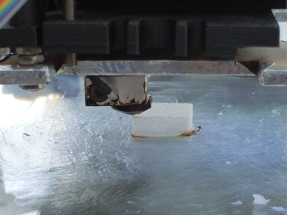 The RepRap printer on the front of the Mobile Fab at work The RepRap printer on the front of the Mobile Fab at work