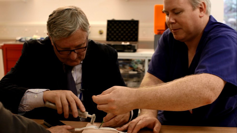 Professor Pepper (l) and Richard Trimlett (r) test an early handheld