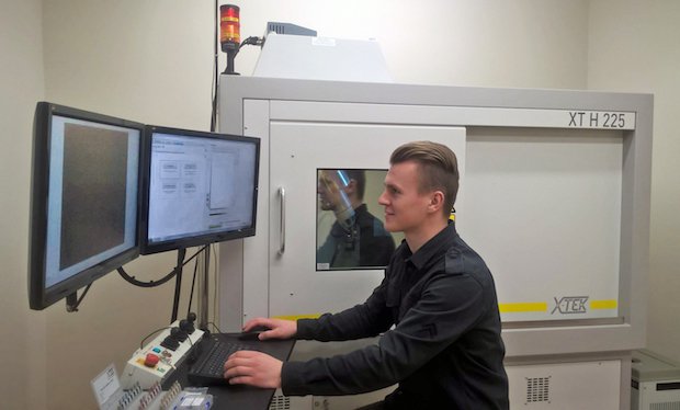 Nikon Metrology jaw implant      Domantas Ozerenskis, Product Quality Manager, Ortho Baltic, operating the Nikon Metrology XT H 225 micro-CT scanner in the inspection department at Kaunas.