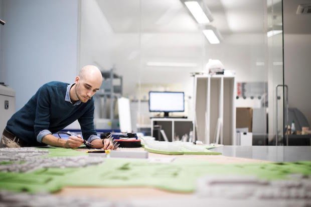 Hobs Studio Barking Riverside      Nathan Stockill and the master plan model of Barking Riverside. - Hobs Studio