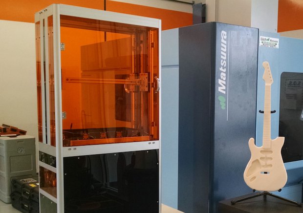 Wave3D Pro 3D printer with scale 3D printed guitar model.