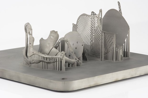 Implants on build plate      3D printed medical implants on build plate. - Renishaw