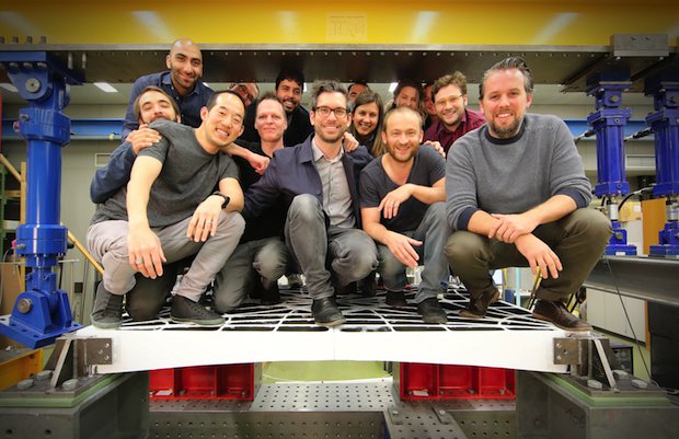Approximately half of the Block Research Group atop of their 3D sand printed floor structure. Philippe Block (right) is joined on the front row by Dr Tom van Mele, co-director of BRG (cent...