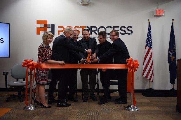 PostProcess Technologies new HQ      Members of the PostProcess Technologies team cutting the ribbon at the Grand Opening of the company's new headquarters.