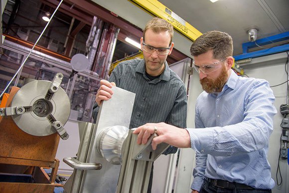 NRC cold spray magnets                Preparing a prototype part for an electric motor in the NRC’s cold spray facility. - National Research Council of Canada