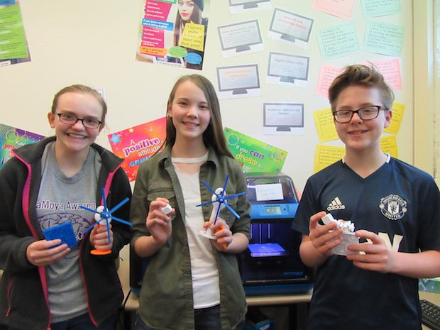 Eight-grade students from Bethel-Tate Middle School, in Bethel, Ohio, USA, displaying their 3D-printed creations from STEAMtrax: Tinkering with Turbines and Makers Empire: Amazing Mazes le...