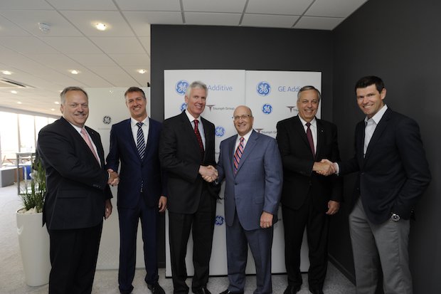 Triumph GE Additive signing      From left to right: Gary Tenison, VP strategy and business development, Triumph Group,  Jason Oliver, President & CEO, GE Additive,  Dan Rowley, President ...