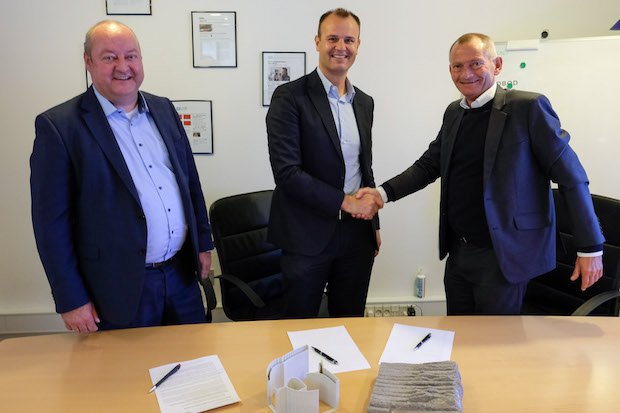 Cobod PERI Group      Handshake after signing the investment agreement. Left to right: Leonhard Braig, member of the Group Management of the PERI Group, Christian Schwörer, Chairman of the...