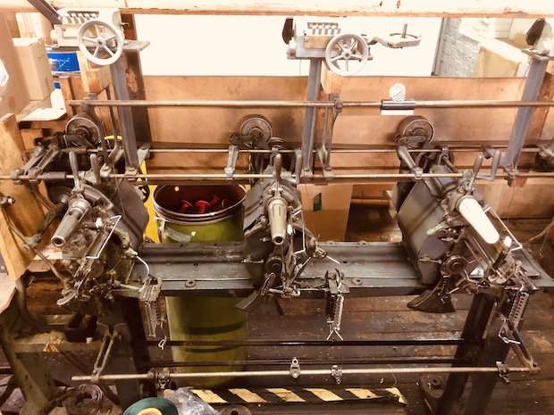 3M BIC winder legacy machine      Winder with the new plastic 3D printed paper cone holder (right).