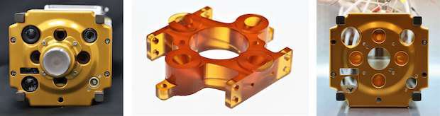 Carbon NASA thrusters      Final vehicle layout with instrumentation packaging (left); the CE 221 thruster design that is packaged between the instrumentation (middle); and metal face (rig...
