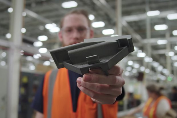 3D printed changeover insert HP sprocket line      A 3D printed quick changeover insert printed with Multi Jet Fusion for HP's Sprocket assembly line. - HP/YouTube