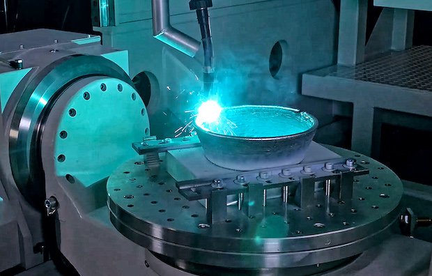 Additive manufacture of a component by WAAM using the integrated welding torch in a 5-axis GEFERTEC machine.