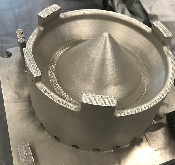 Additively manufactured, cobalt-chrome sump cover for F110 engine produced by GE Aviation on the Concept Laser M2 machine. - GE Additive