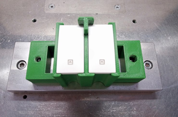 3D printed assembly-line tool designed to hold switches during production process.