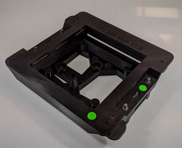ESD-compliant gluing jig for display assembly 3D printed in Stratasys ABS-ESD7 material.