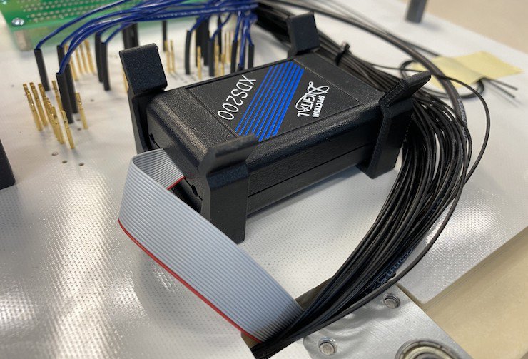 Markforged Onyx ESD      Testing fixture printed in Onyx ESD. - Markforged