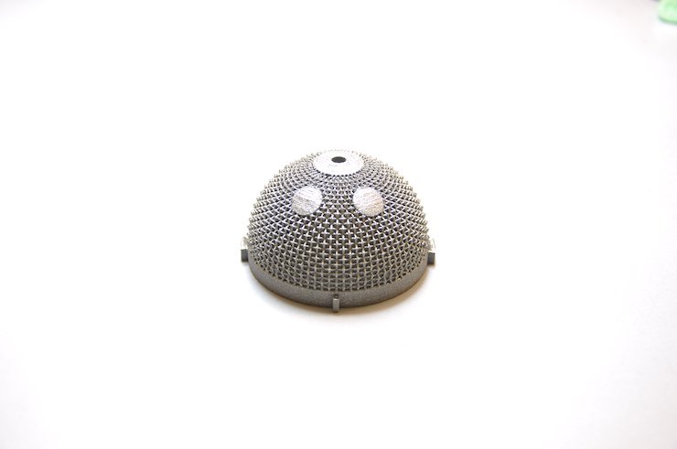 3D printed acetabular cup Proxera ZARE      3D printed acetabular cup, used in hip-joint surgery: the ball fits securely inside the socket and rotates easily within the smooth cartilage li...