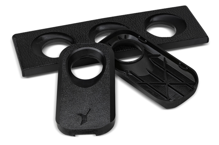 Rigid, flame-retardant consumer electronics and aerospace housings printed in Figure 4 High Temp 150C FR Black, for long-lasting production parts requiring UL94 V0, FAR 25.853, and FAR 23....