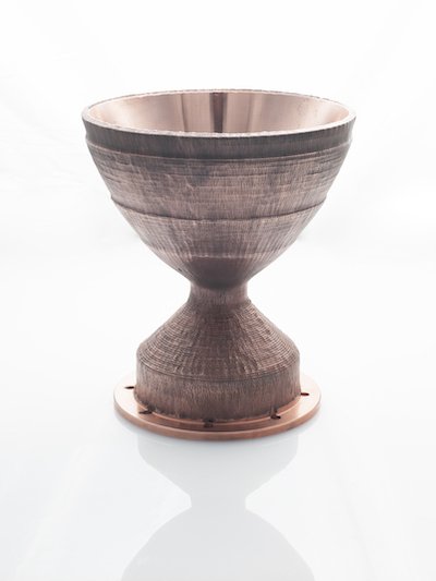 Rocket nozzle liner printed with SPEE3D technology. - SPEE3D