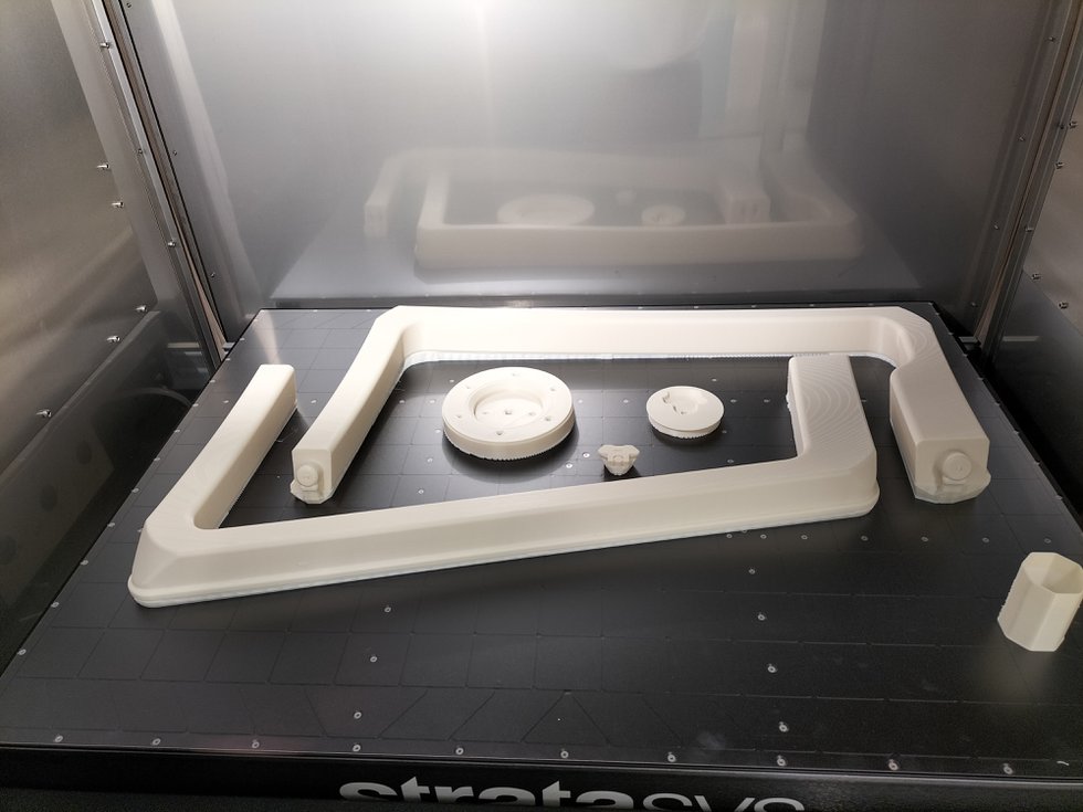 Prototype parts with an aesthetic function, designed for a non-functional demonstration aircraft, printed in ASA with the Stratasys F770 3D printer.