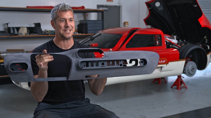 Ant Anstead shows a 3D printed part for the Lotus Type 62-2 coachbuilt as shown in the Discovery+ documentary Radford Returns.