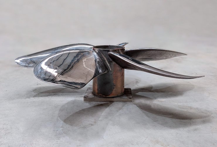 12.1kg naval propeller printed with the Meltio Engine Robot Integration in 316L at a cost of 189.71 EUR. - Meltio