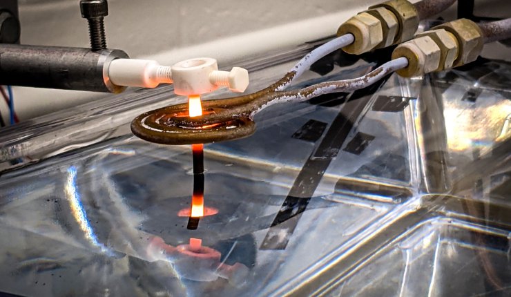 Rod of 3D printed superalloy going through the new heat treatment at MIT. - Dominic David Peachey