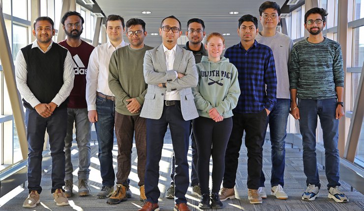 Sougata Roy, assistant professor of mechanical engineering (center), with his research group. To Roy’s right are Ph.D. research assistants. To the his left are other graduate research assi...
