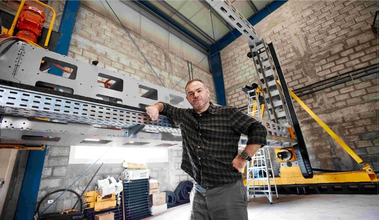 AC3D Founder & CEO Boris Kozlov with one of the company's printers in Dubai - AC3D