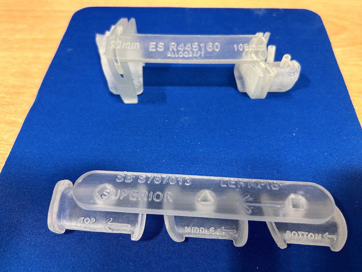 3D printed surgical guides produced by University Hospital Birmingham on the Stratasys J5 MediJet machine. - University Hospital Birmingham