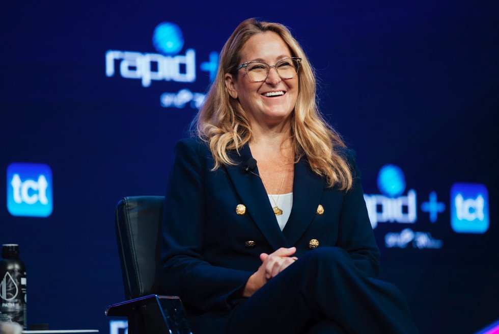 Michelle Sidwell on stage at RAPID + TCT 2024 - SME