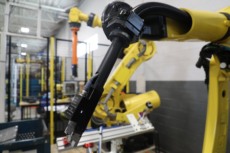 Robotic arm being used in the new North American Stratasys Tooling Center. - Stratasys