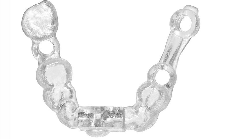 Stratasys Objet Eden 260V dental      Surgical guide designed using 3Shape software and produced on a Stratasys Objet Eden260V 3D Printer.