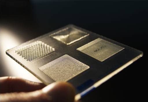 3D printed freeform optics.