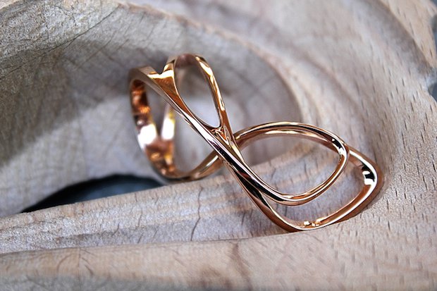 3D printed Mobius ring in rose gold.