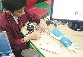 Rishabh Java mind controlled 3D printed bionic arm                Rishabh Java working on his award-winning bionic arm