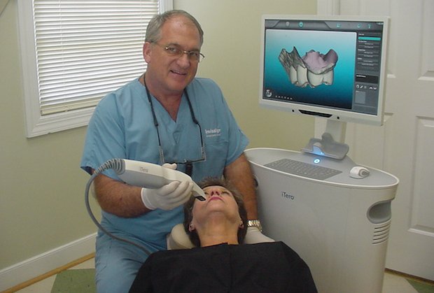 Dr. Perry E. Jones with intraoral scanning device.