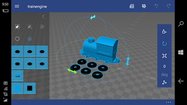 3D Builder app 2      A 3D-printed train engine model being scanned and altered using the 3D Builder app - Softpedia