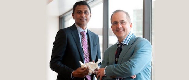 Ottawa Hospital 3D printing medical program      Dr. Adnan Sheikh, from Ottawa Hospital's Radiology department, holds an exact replica of a patient’s pelvis that has one hip eaten away by ...