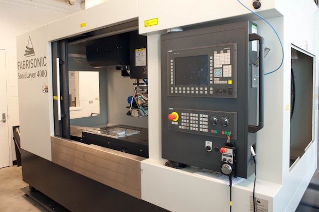 Fabrisonic SonicLayer 400      Fabrisonic’s UAM technology boasts high productivity. The SonicLayer 400 has a bed of 24” x 36”.