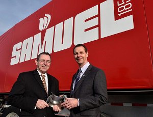 Samuel Burloak Tech metal 3D printing                Samuel Manufacturing President Colin Osborne and Peter Adams, President Burloak Technologies, hold a component produced with Burloak's ...