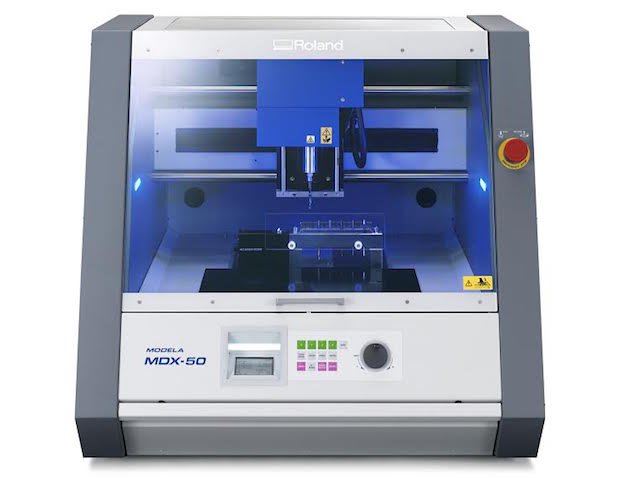 Roland DG MODELA MDX-50      The MODELA MDX-50 is capable of producing high-accuracy prototypes from nylon, modelling board, wax, PVC and wood.