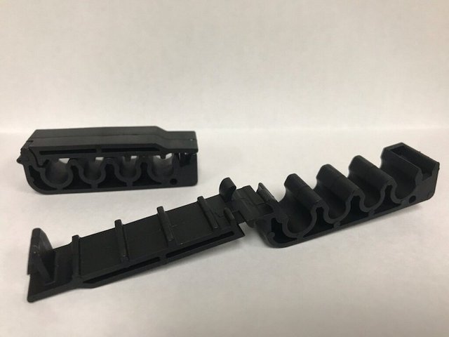 Fuel-line clip injection moulded with recycled 3D printing material.