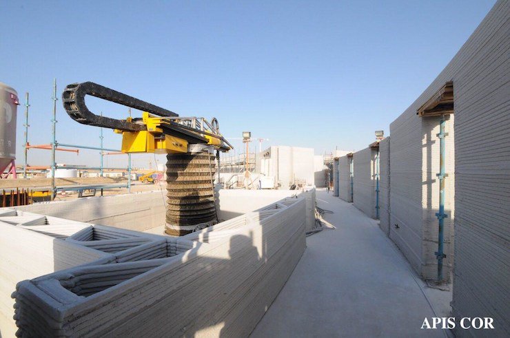 An Apis Cor system 3D printing a building in Dubai, which achieved the Guinness World Record for the largest 3D printed building on Earth