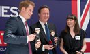 MakieLab's Jo Roach presents Harry and David Cameron with their Makie dolls